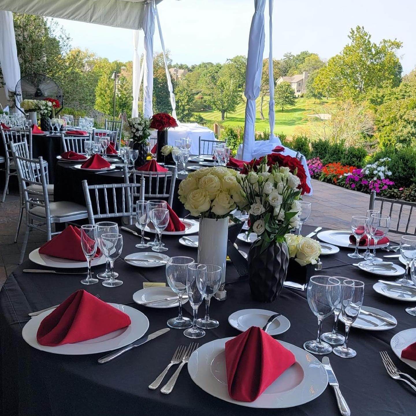 Outdoor table settings and decorations for a bar mitzvah event in New Jersey